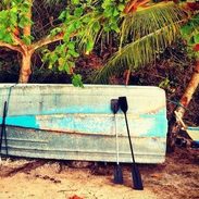 A photo of a canoe on its side.