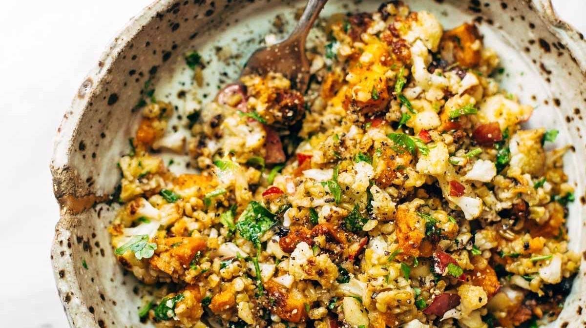 Autumn Glow Salad in a bowl with a fork.
