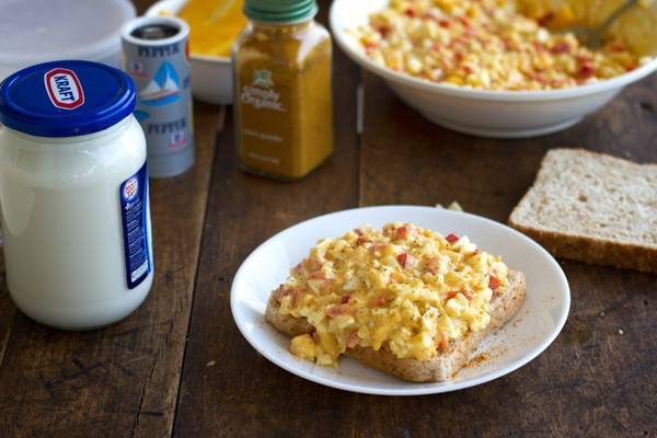 Egg salad on a white plate.